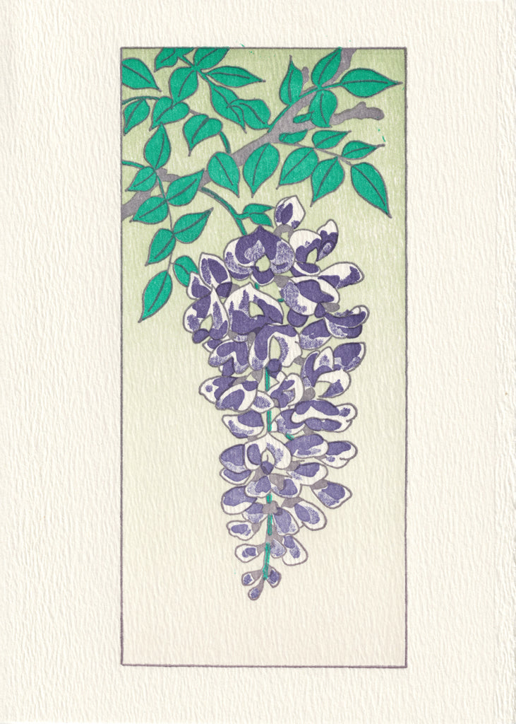 The exterior of the greeting card depicts an image of purple wisteria hanging from a branch. 